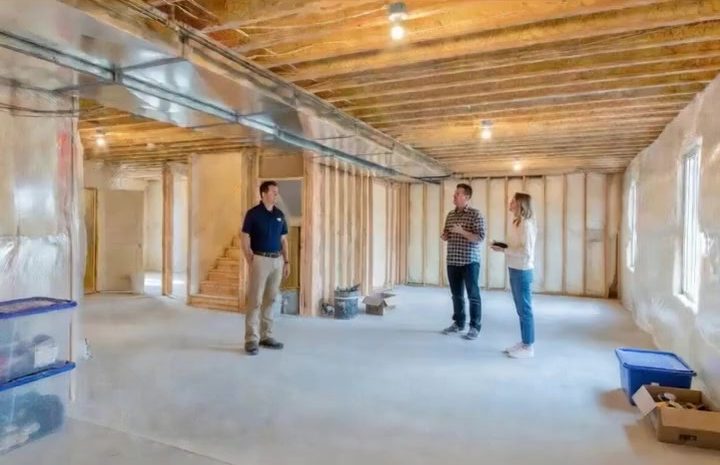 Walking a basement with homeowners